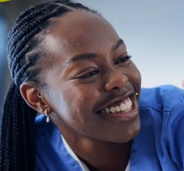 Care assistant smiling