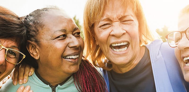 Multiracial senior women having fun together